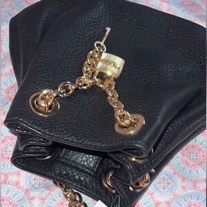 Michael Kors Black Leather Backpack with Gold Accents